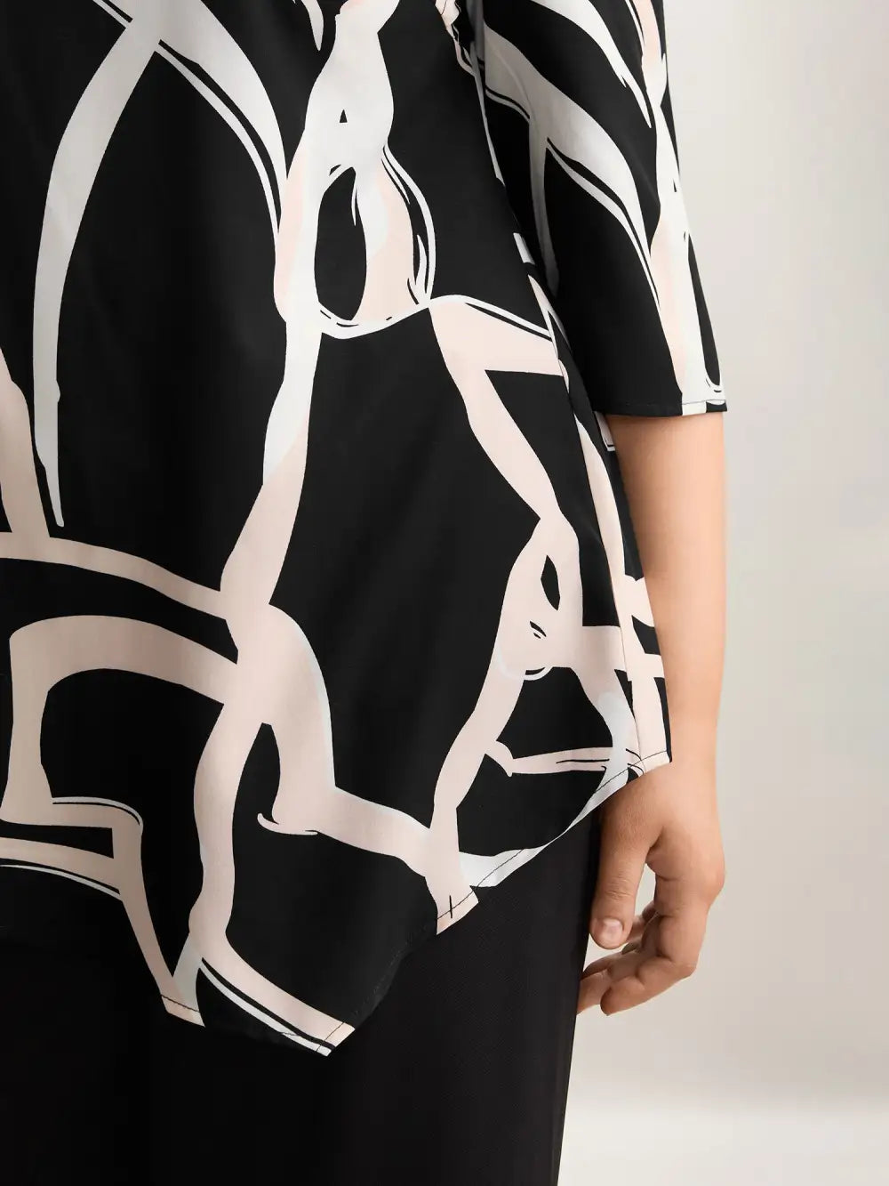 Asymmetrical Line Print Hi Low Hem Blouse